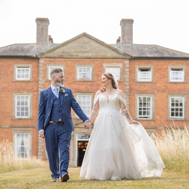 Couple outside main house